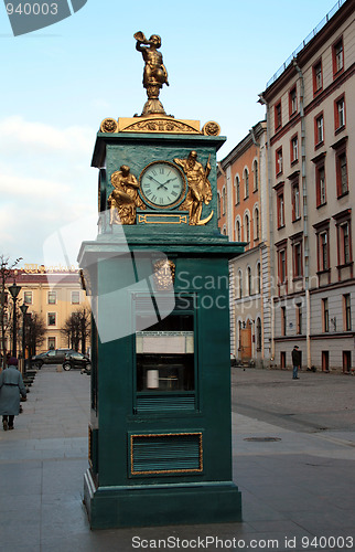 Image of old meteorology station with clock