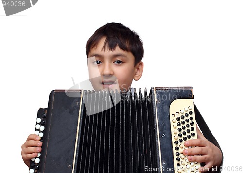 Image of boy plays on accordion