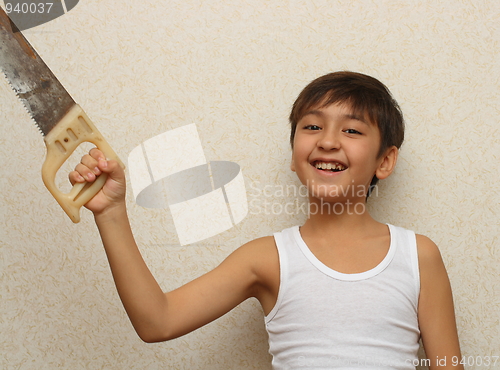 Image of smiling boy with saw