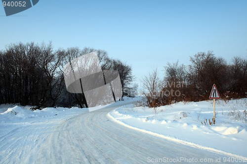 Image of winter road with sign