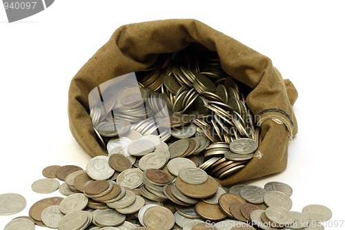 Image of money coins pour out from bag