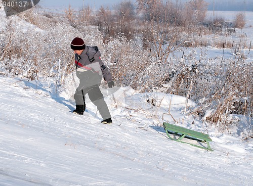 Image of asian boy go uphill