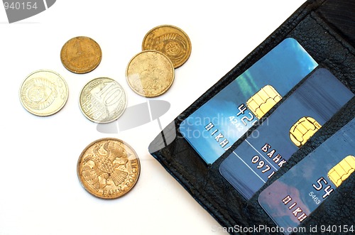 Image of coins and plastic cards