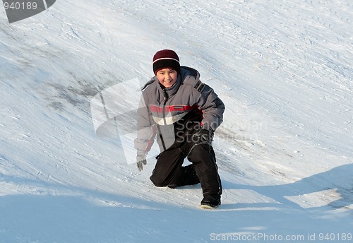 Image of happy asian boy on hill