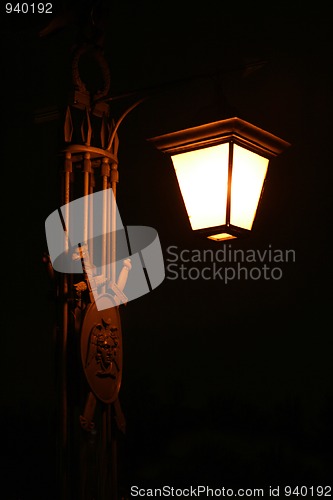 Image of old electric street lamp, lighting in night