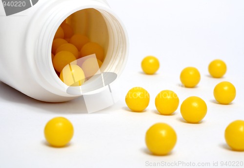 Image of yellow vitamin dradees