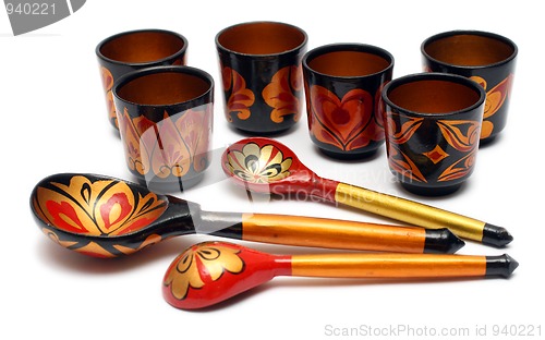 Image of set of russian wooden spoons and cups