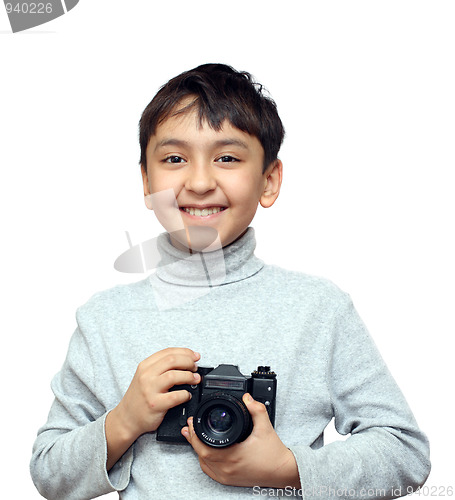 Image of smiling boy with camera