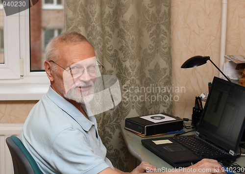 Image of senior with laptop