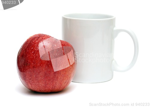 Image of red apple and white mug