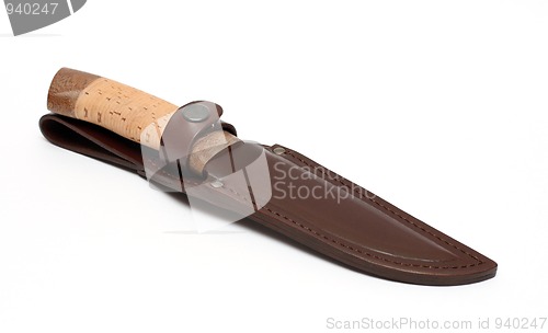 Image of hunting knife in leather sheath
