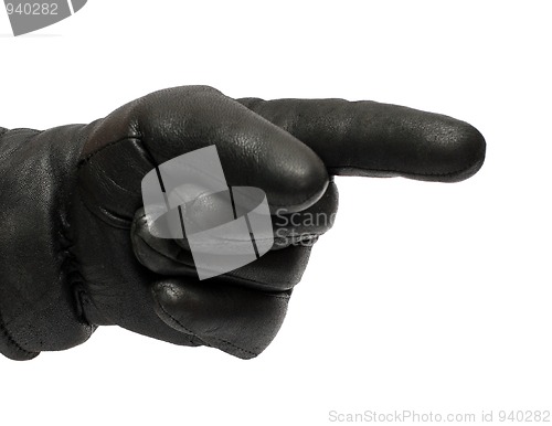 Image of hand in black glove showing direction