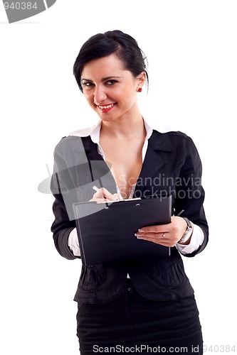 Image of business woman writing