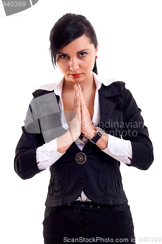 Image of business woman praying
