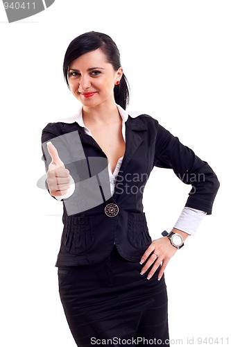 Image of Business woman giving thumbs up