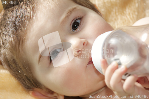 Image of Serene baby drinking water