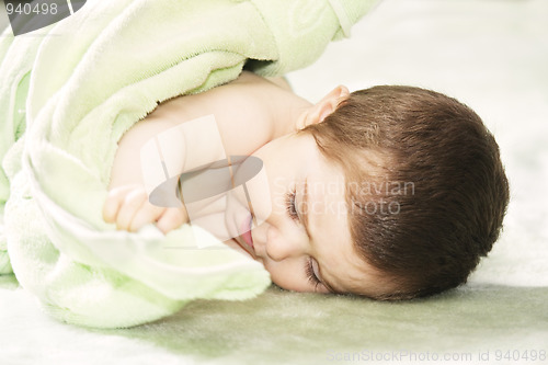 Image of Cute baby with towel