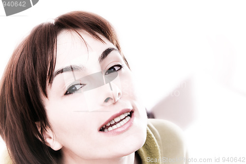 Image of Young woman in bed