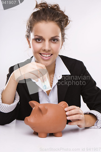 Image of Savings - Business woman at work