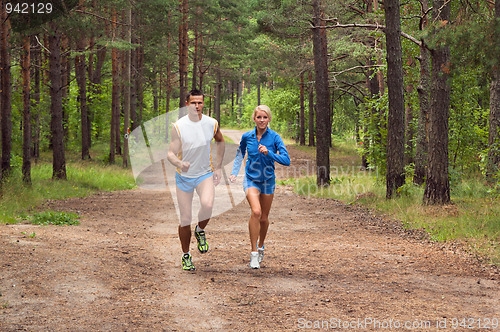 Image of Sportsmen. The young man and the girl