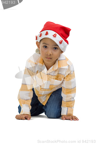 Image of boy with santa claus hat