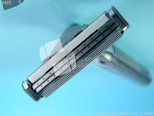 Image of Shaving device over blue