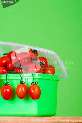 Image of container with fresh tomatoes