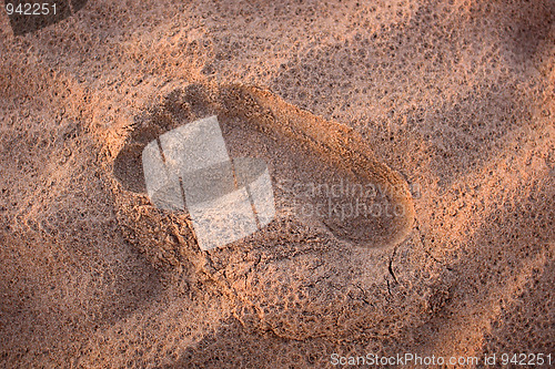Image of footprint in the sand