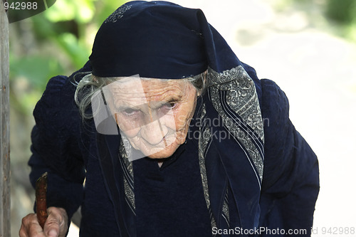 Image of Senior woman with stick