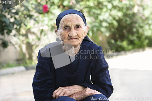 Image of Elderly woman hands folded