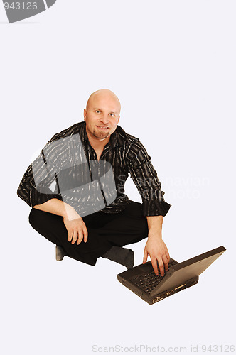 Image of Man with laptop.