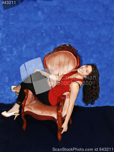 Image of Young Lady in armchair.