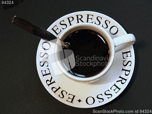 Image of espresso coffee in cup with spoon