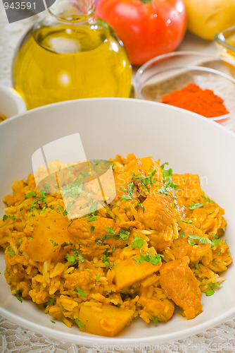 Image of curry beef rice and potatoes