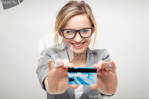 Image of woman holding new credit card