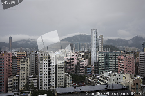 Image of cityscape under a stormy weather 