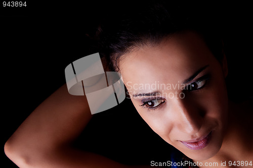 Image of beautiful woman, holding her hair with his hand