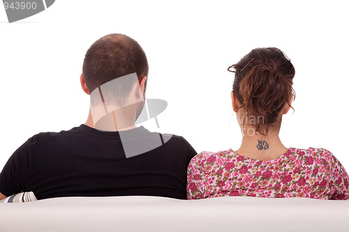 Image of couple from back, on couch, 