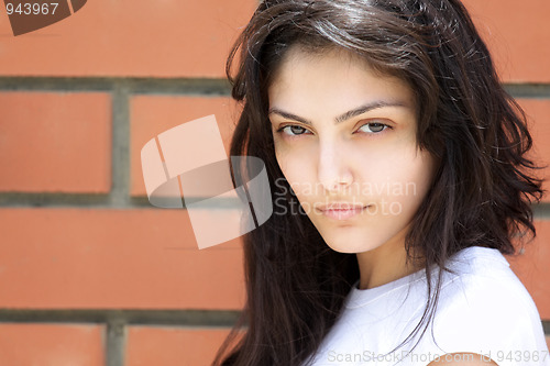 Image of Serious brunette woman