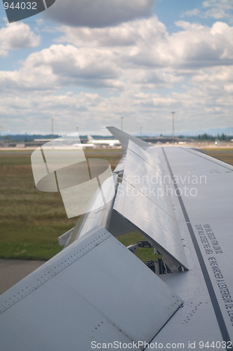 Image of Wing of airplane landing