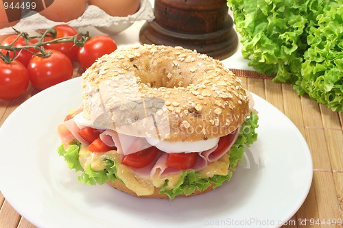 Image of Bagel with ham and egg