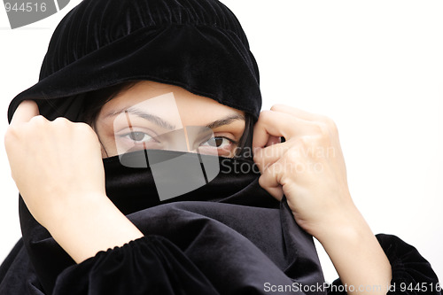 Image of Woman in shawl covering face