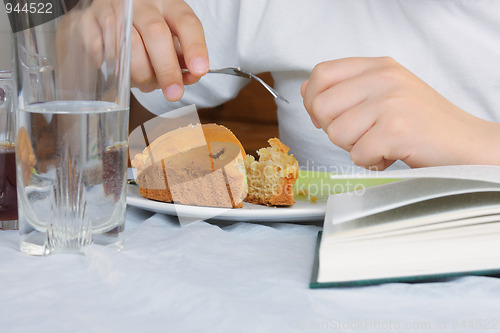 Image of Hands with cake