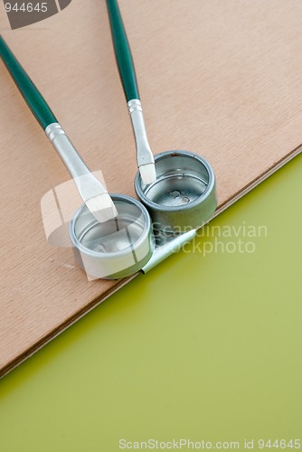 Image of Painter pallete detail with brushes