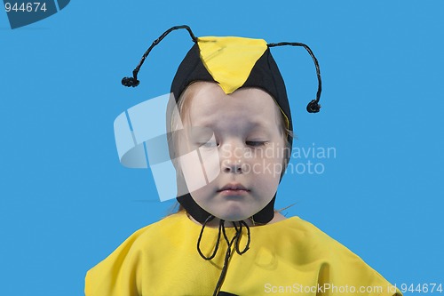 Image of Small girl is dressed at bee costume