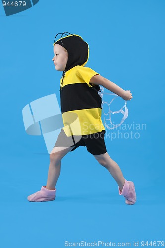 Image of Small girl is dressed at bee costume