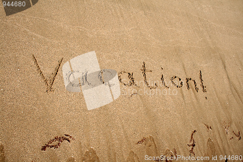Image of Text on the sand