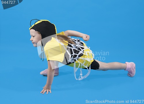 Image of Small girl is dressed at bee costume