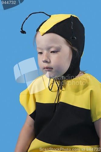 Image of Small girl is dressed at bee costume