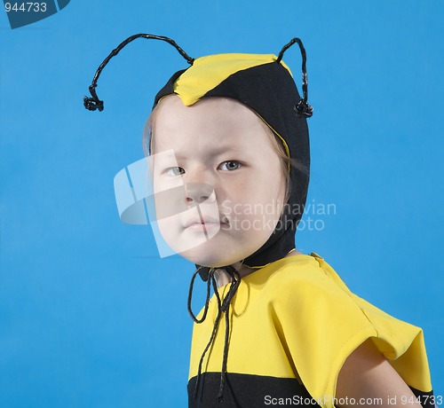 Image of Small girl is dressed at bee costume